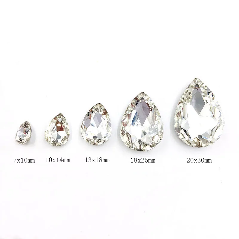 Стразы смешанного размера с белыми искусственными кристаллами пришивные стразы