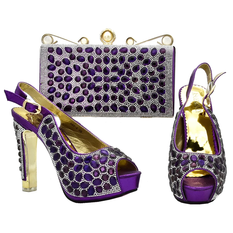 Комплект из итальянских туфель и сумочки красного цвета в нигерийском стиле