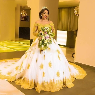 

African Black Girls Gold Lace Wedding Gowns 2020 Long Sleeves Beaded Appliques Skin Tulle Long Sleeves Princess Bridal Gowns