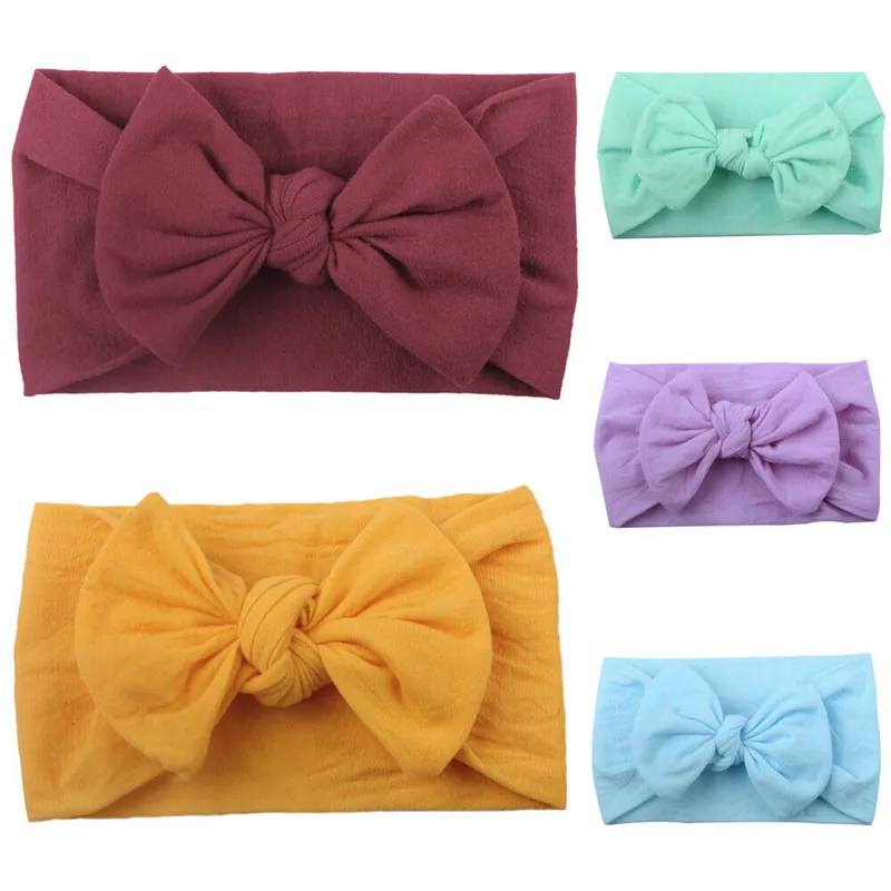 Повязка на голову эластичная однотонная с бантом для девочек | Аксессуары одежды