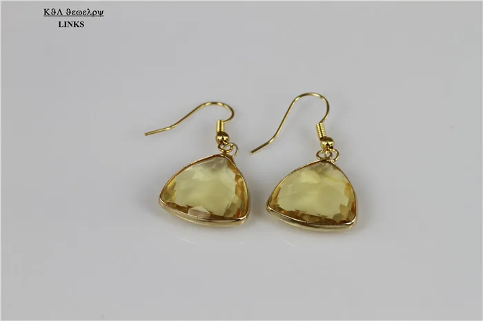 Серьги с кристаллами желтого стекла кварца треугольная оправа граненый крючок