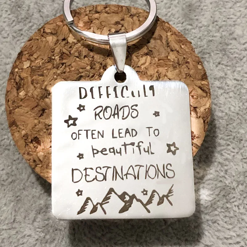 Креативные брелоки выгравированные трудные дороги приводит к красивому месту