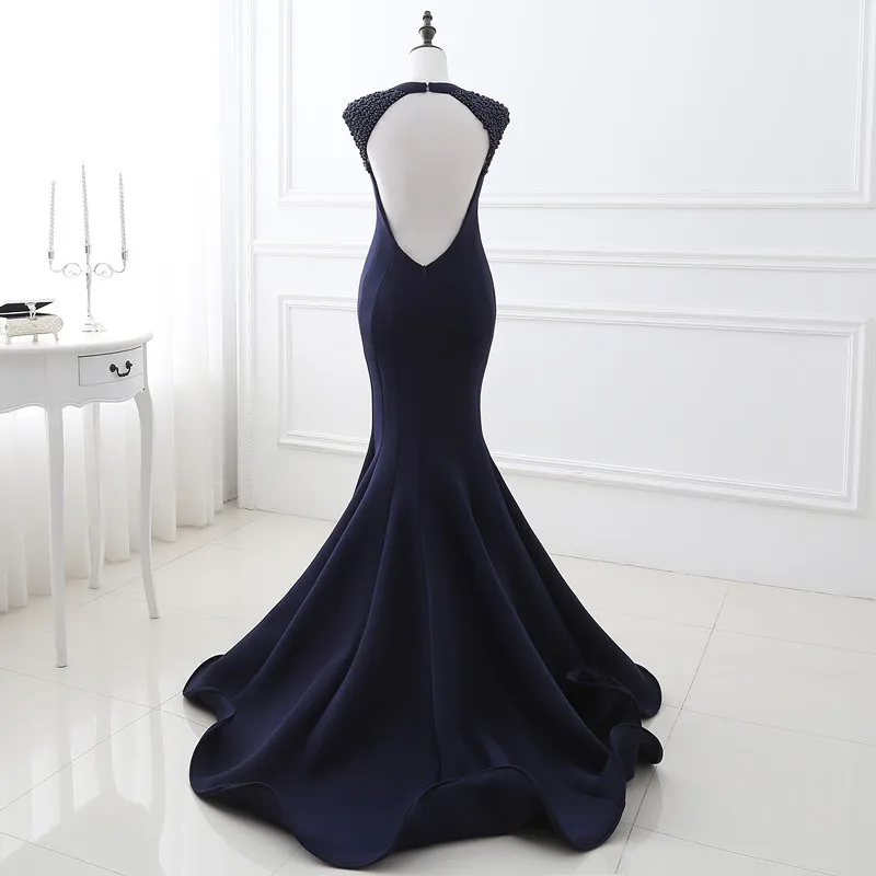 Женское вечернее платье русалка темно синее длинное с рукавами крылышками и