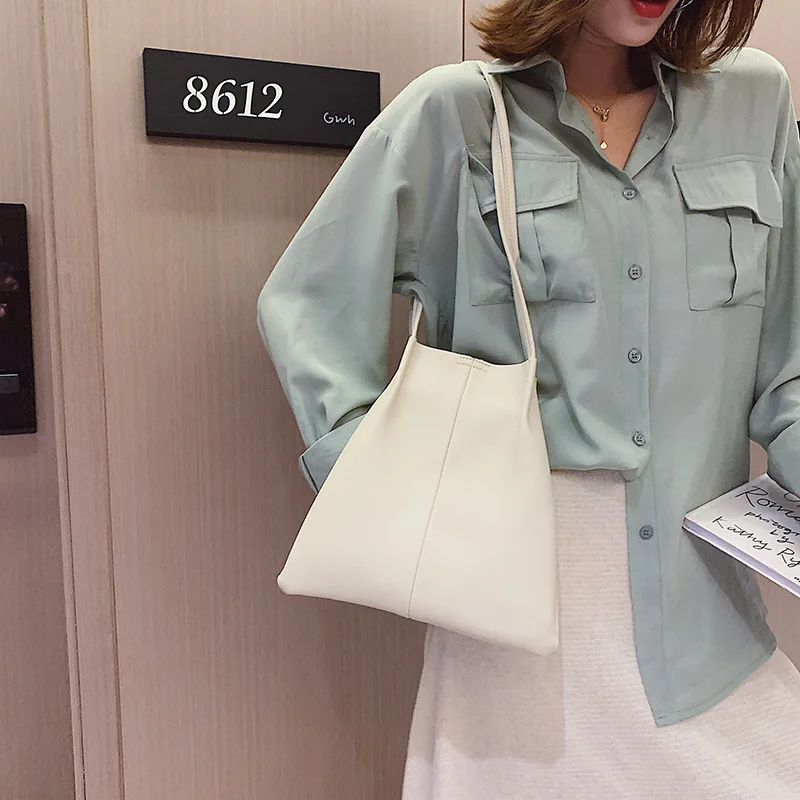 Женская качественная сумка мешок на шнурке мягкая кожаная сумочка маленькая