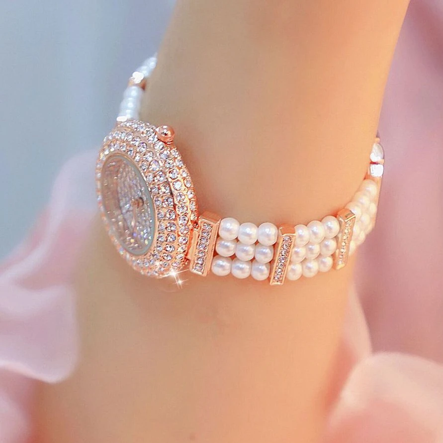 Часы наручные женские кварцевые под розовое золото с жемчугом и бриллиантами |