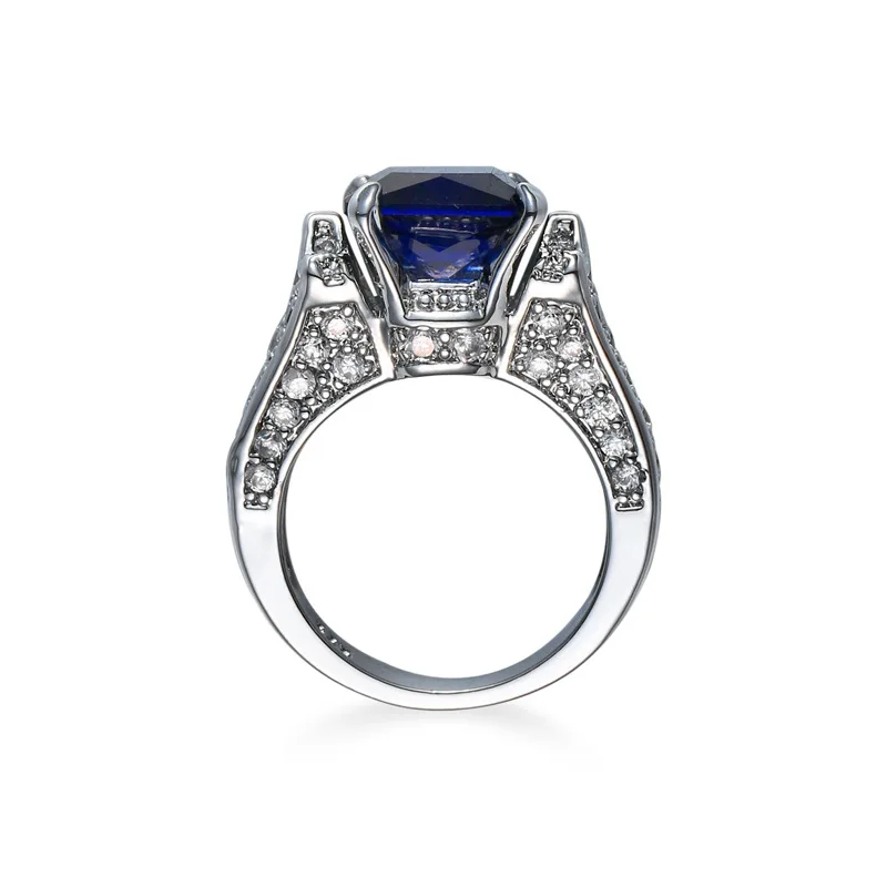 Женское кольцо с фианитом 2 карата обручальное серебряного цвета синим