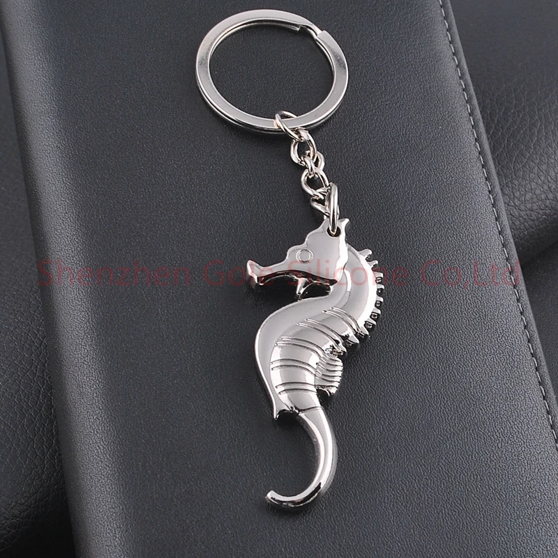 Металлический мини брелок для пива в форме гиппокампа серебряный открывалка