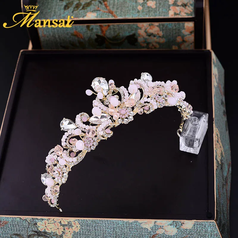 Великолепный розового цвета с украшением в виде кристаллов принцессы тиара