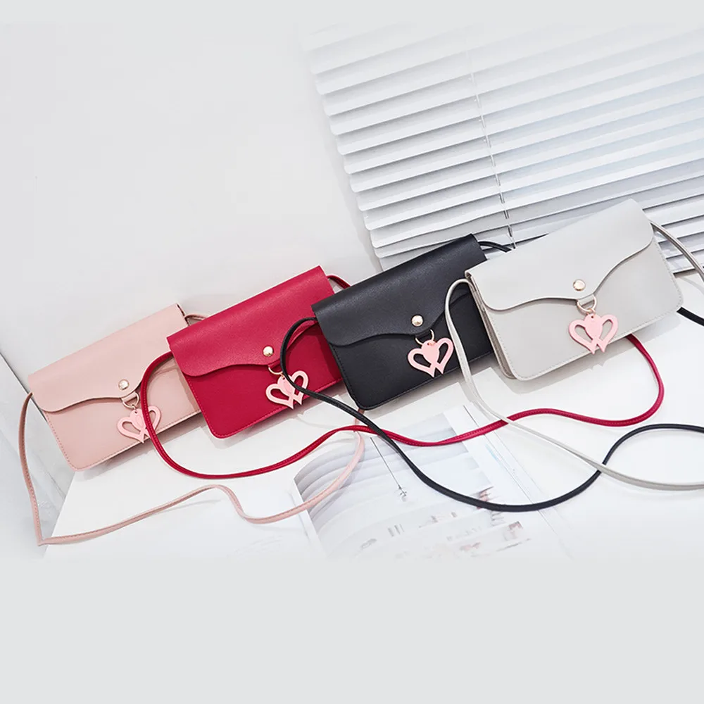 Женская сумка через плечо molave на одно с украшением в виде сердечек молнии косой