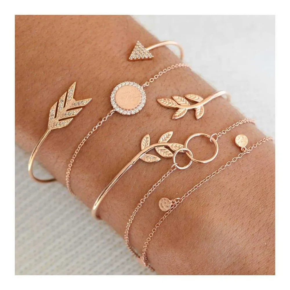 

pack of 5 inspired bangle bracelet with arrow/leaf embossed and coin pendant design in mixed link chains in gold tone