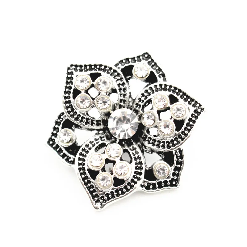 

Hot Sale 10pcs/lot Metal Hollow Out Flower White Crystal Snap Buttons Charms Fit 18mm/20mm Snap Bracelets Necklace DIY Jewelry