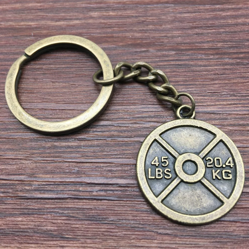 Цельнокроеное платье брелок Вес подъема с героями из фильмов 28x24 мм античная