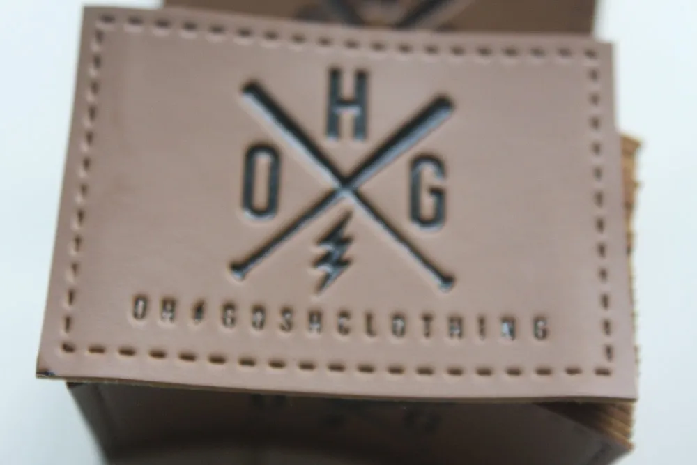 Пользовательские тисненые этикетки из ПУ в основном для джинсов или сумок