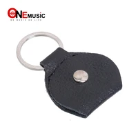 100 pcs top quality guitar pick holder genuine leather guitarra plectrum case bag keychain shape guitar accessories