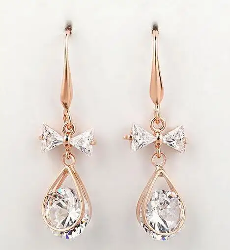 Новые серьги-гвоздики с прозрачным кристаллом жемчугом цирконием бантом сердцем