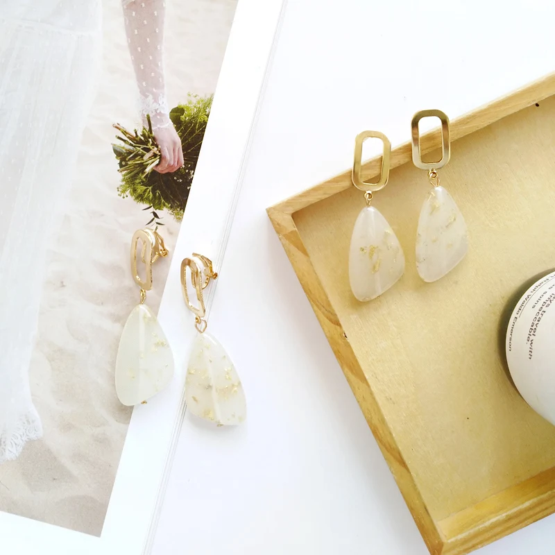 

Elegant Irregular Stone Geometric Alloy Earrings Gold Glitter Inside Fashion Jewelry