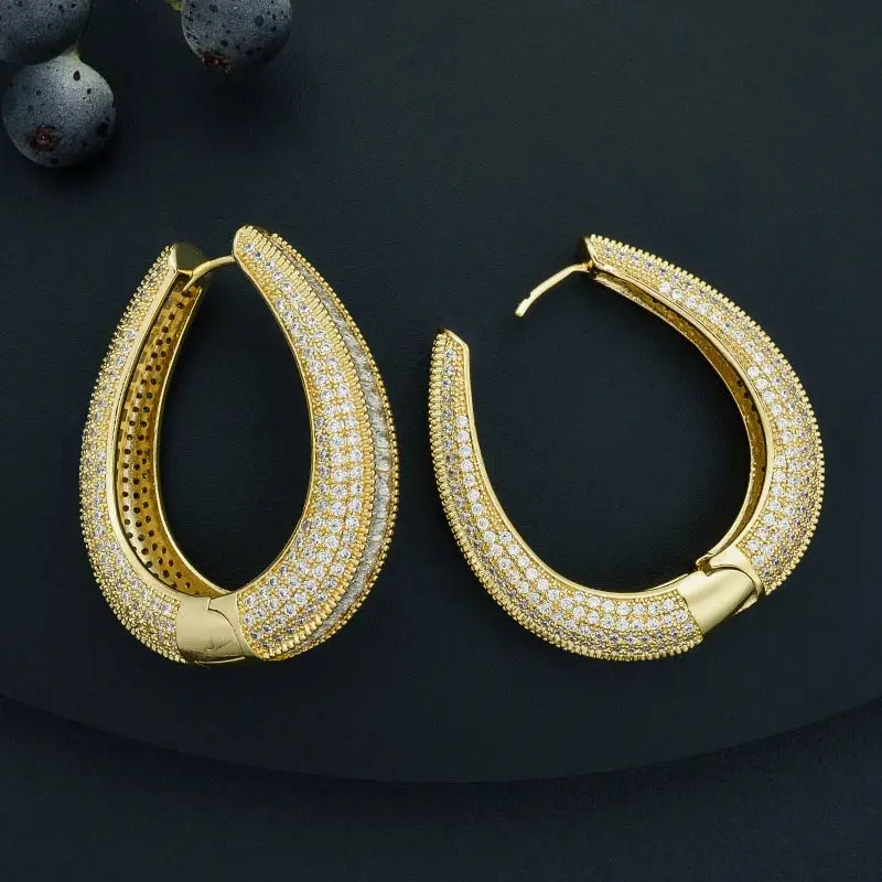 Роскошные плетеные серьги ModemAngel с разноцветными микро фианитами женские