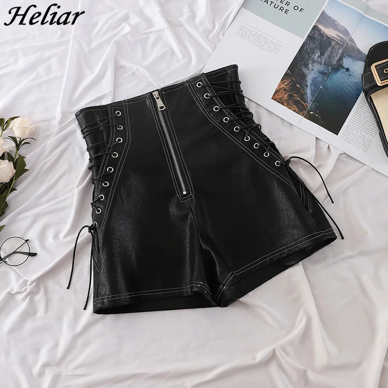

HELIAR Women Black Leather Shorts Criss Cross Bandage Short Pants Fashion High Street Solid PU Shorts Slim Sexy Ripped