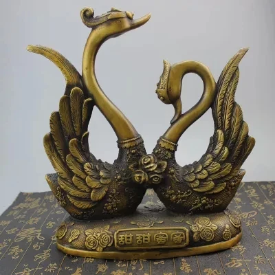 

Antique brass bronze swan honey, home decorations.