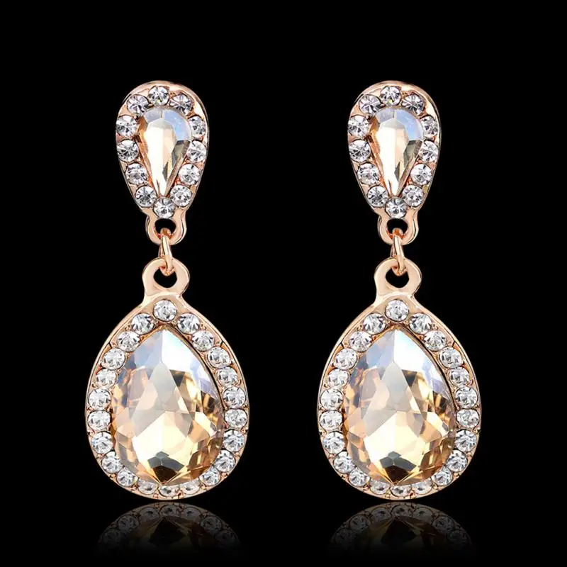 Женские ажурные длинные серьги подвески цвета шампанского с кристаллами