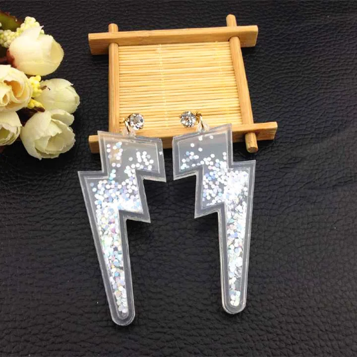 Большие преувеличенные акриловые серьги молнии блестящие с блестками и