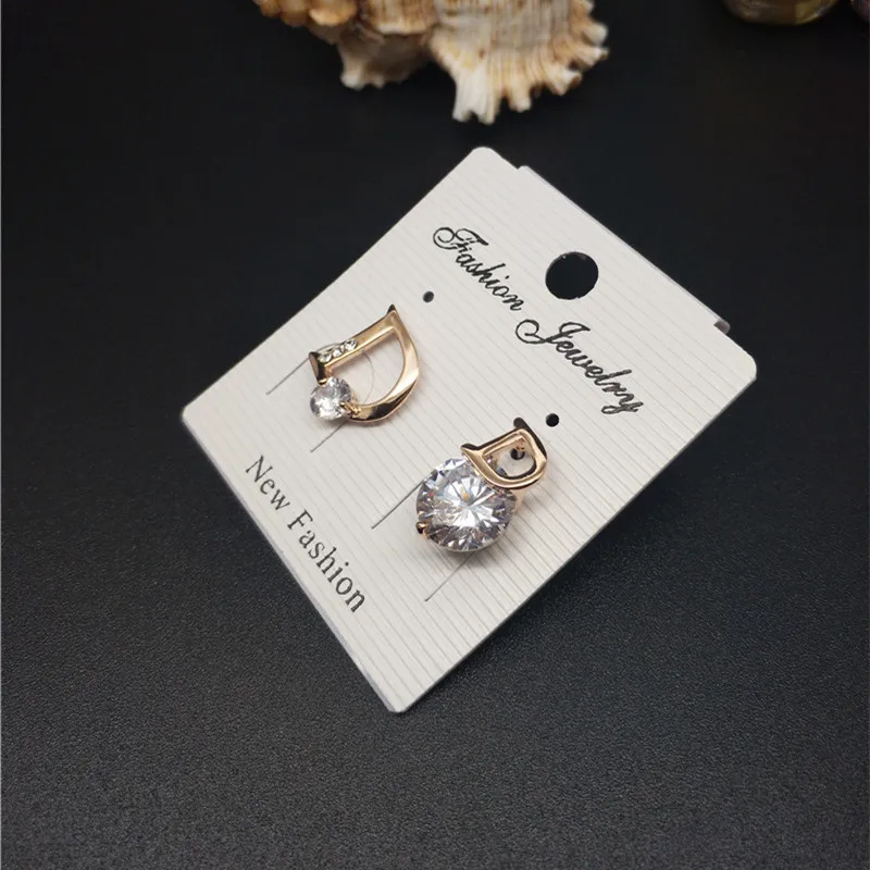 Серьги женские из натурального розового золота с цирконием фирменный дизайн