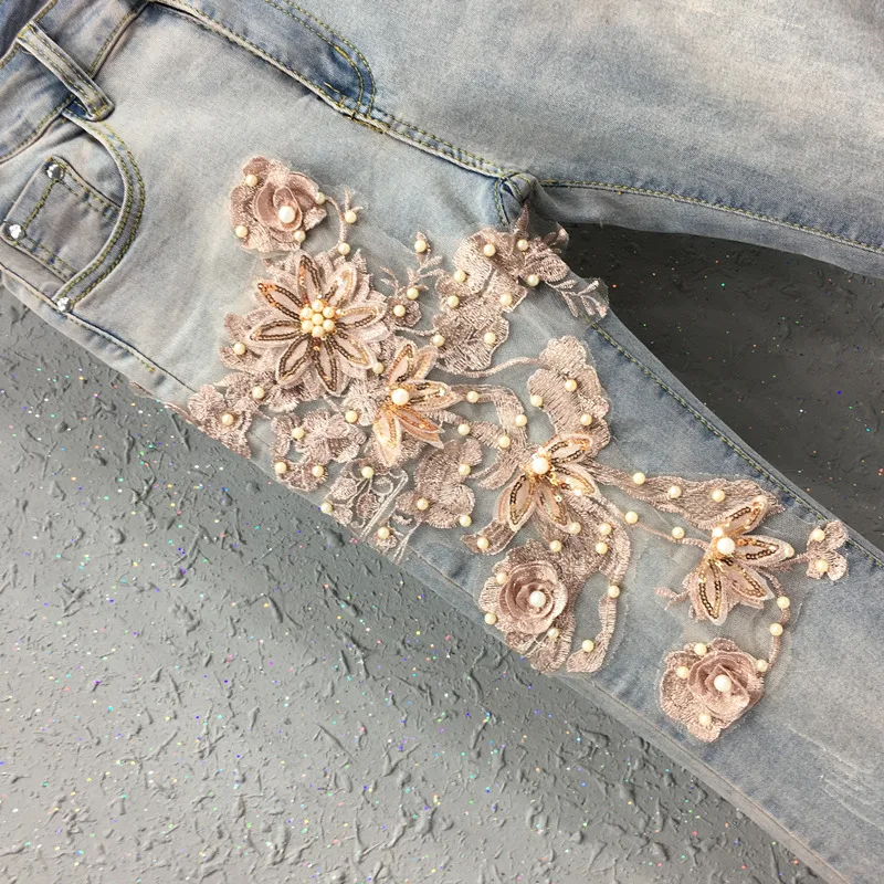 Женские джинсы с кисточками эластичные высокой талией и цветочной вышивкой |