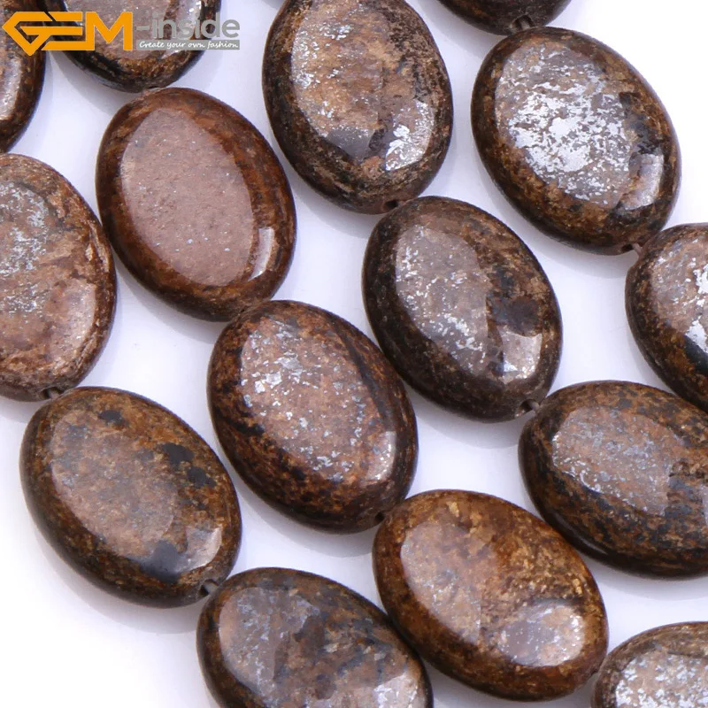 Драгоценный камень внутри натуральный плоский овальный коричневый бронзовый
