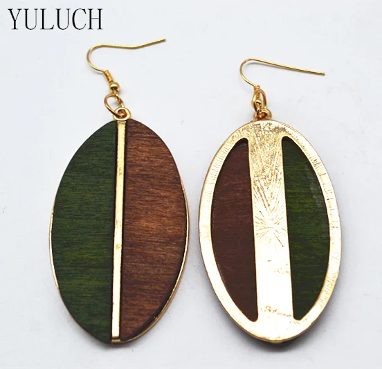 Женские деревянные серьги полукруглые минималистичные в форме листьев |