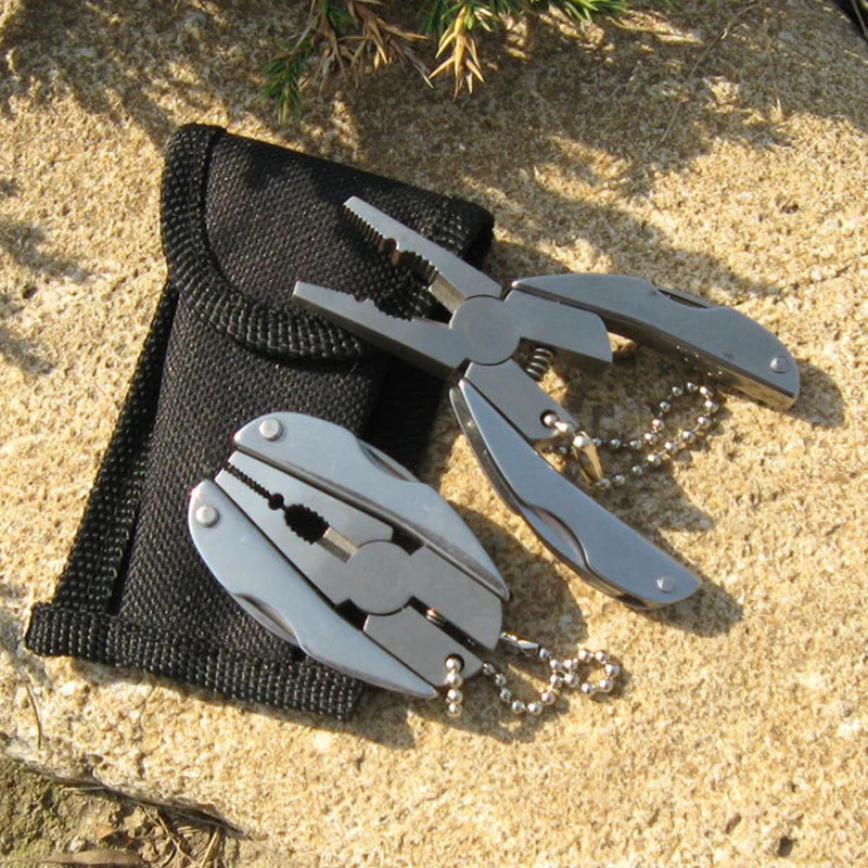 

H907 Outdoor living supplies portable multi-functional tool pliers outdoor survival folding knife / clamp camping / walking EDC