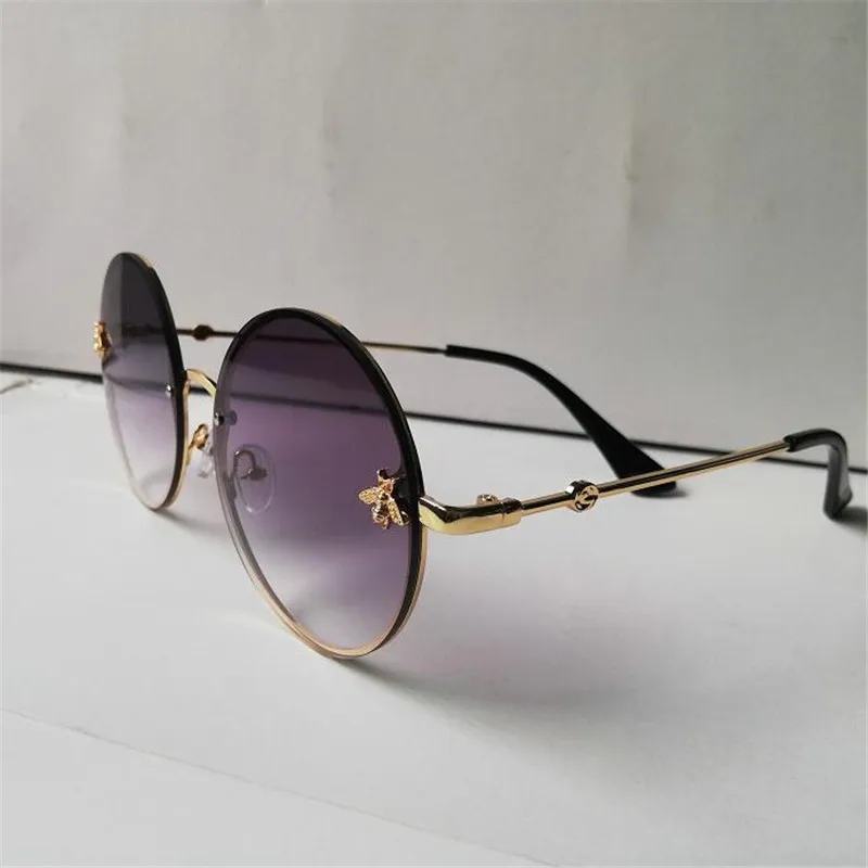 Солнцезащитные очки KAPELUS в круглой металлической оправе женские солнцезащитные