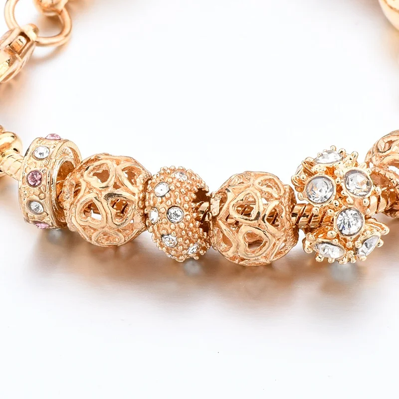 Женский браслет с подвесками из золотых бусин и кристаллов SBR170008 | Украшения