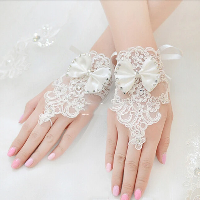 

Новые модные свадебные перчатки с кружевной аппликацией и бриллиантовым бантом, свадебное платье, перчатки, Элегантные Короткие рукавицы, ...