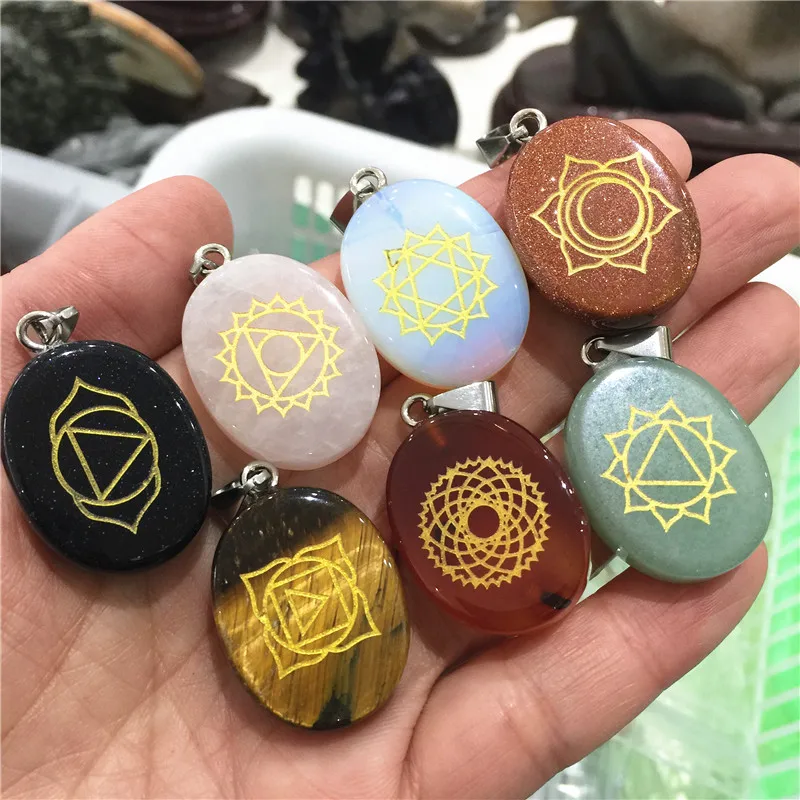 

Beautiful Natural 7 Colors Crystal Stone Carved Chakra Pendant Oval Shape Reiki 7 Chakra Stone Pendant Necklace