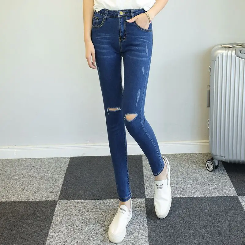 Разорвал отверстие джинсы женщина тощий тонкий джинсовой карандаш брюки женщины