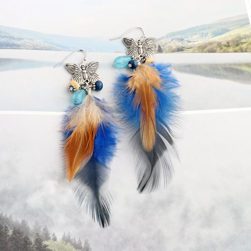 Женские серьги с голубым пером и бабочкой Осенние пушистые аксессуары для