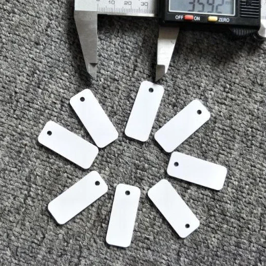 13.56MHz ISO15693 CODE-X PVC cards with holes for clothing management 36*15mm |