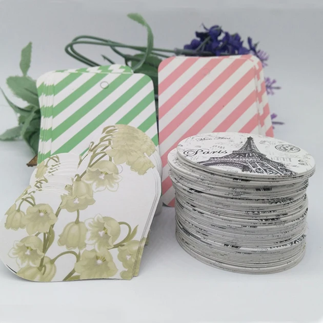 

Customized logo price tags for clothing/printed sewing hang tags good quality garment tags for bags Jewelry luggage