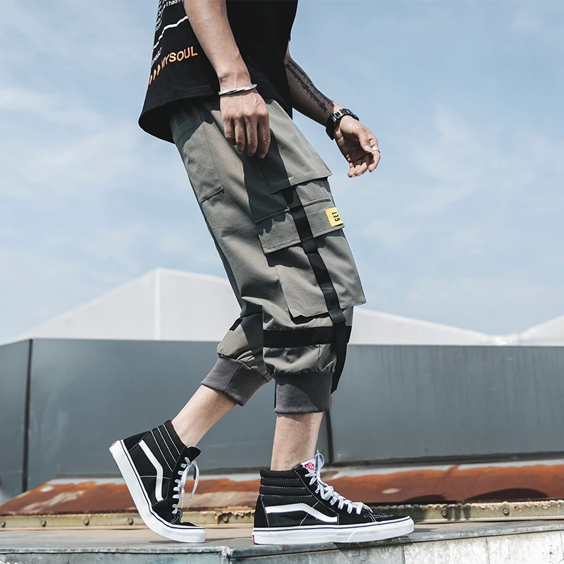 Мужские штаны шаровары в стиле хип хоп черные с несколькими карманами и лентами