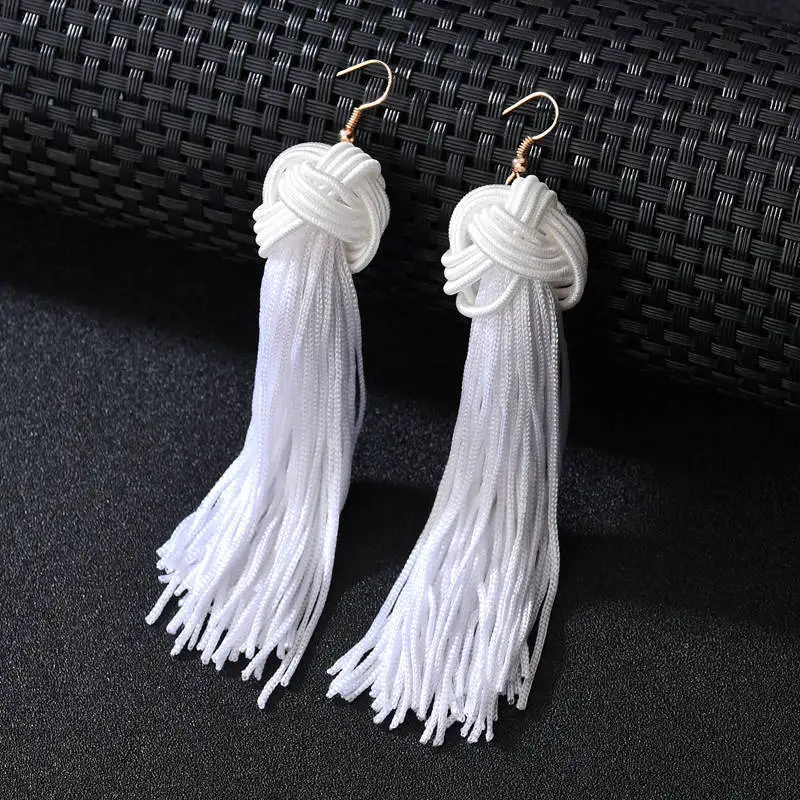 

The new fashion Bohemian hand-woven ball long tassel earrings jewelry female
