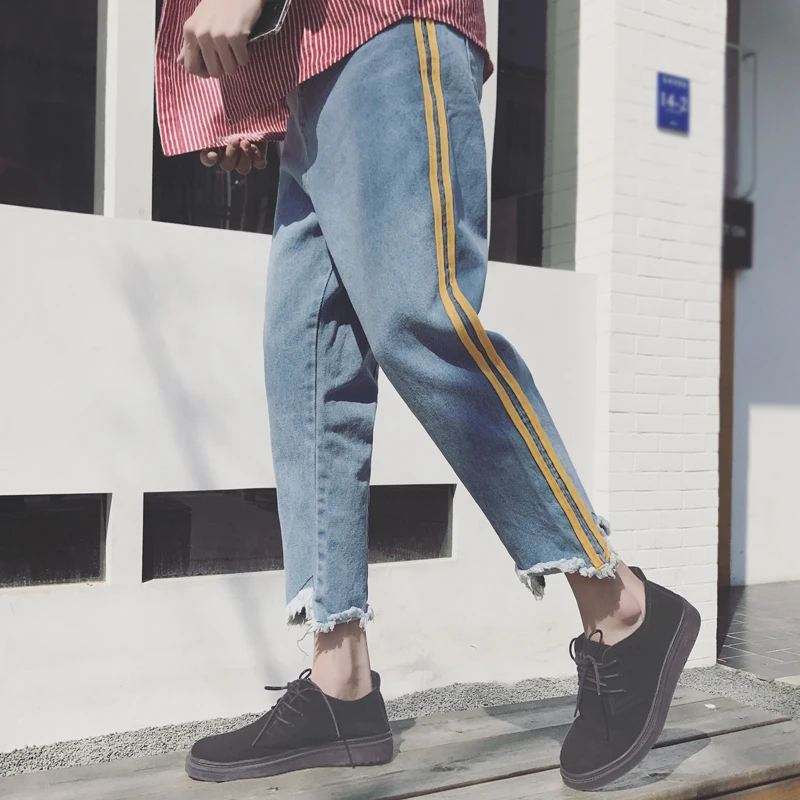 2018 осенние новые джинсы мужские тонкие модные потертые слезы старые джинсовые