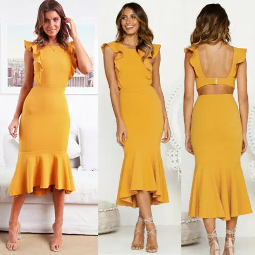 Винтажное женское платье средней длины с круглым вырезом и открытой спиной