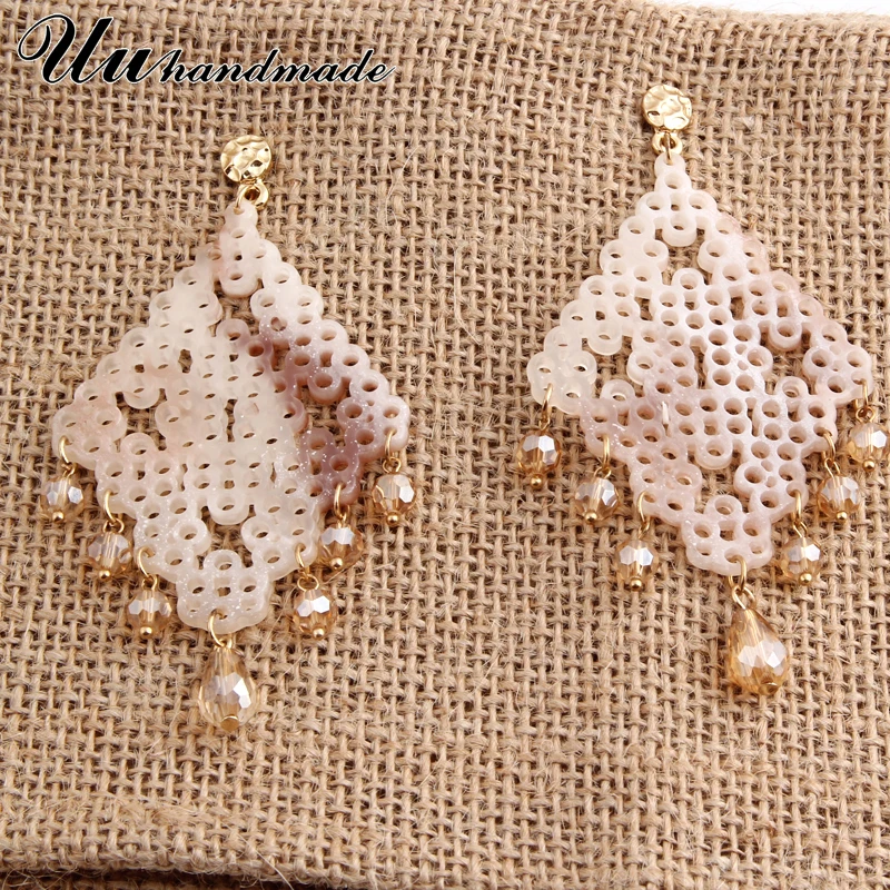 Новые богемные дизайн Обувь со сквозными отверстиями с украшением в виде