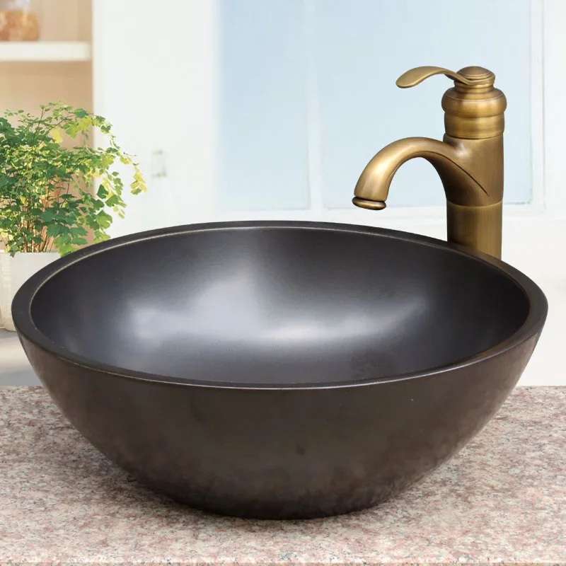 Средиземноморский круглый стол черный умывальник ванная комната керамический