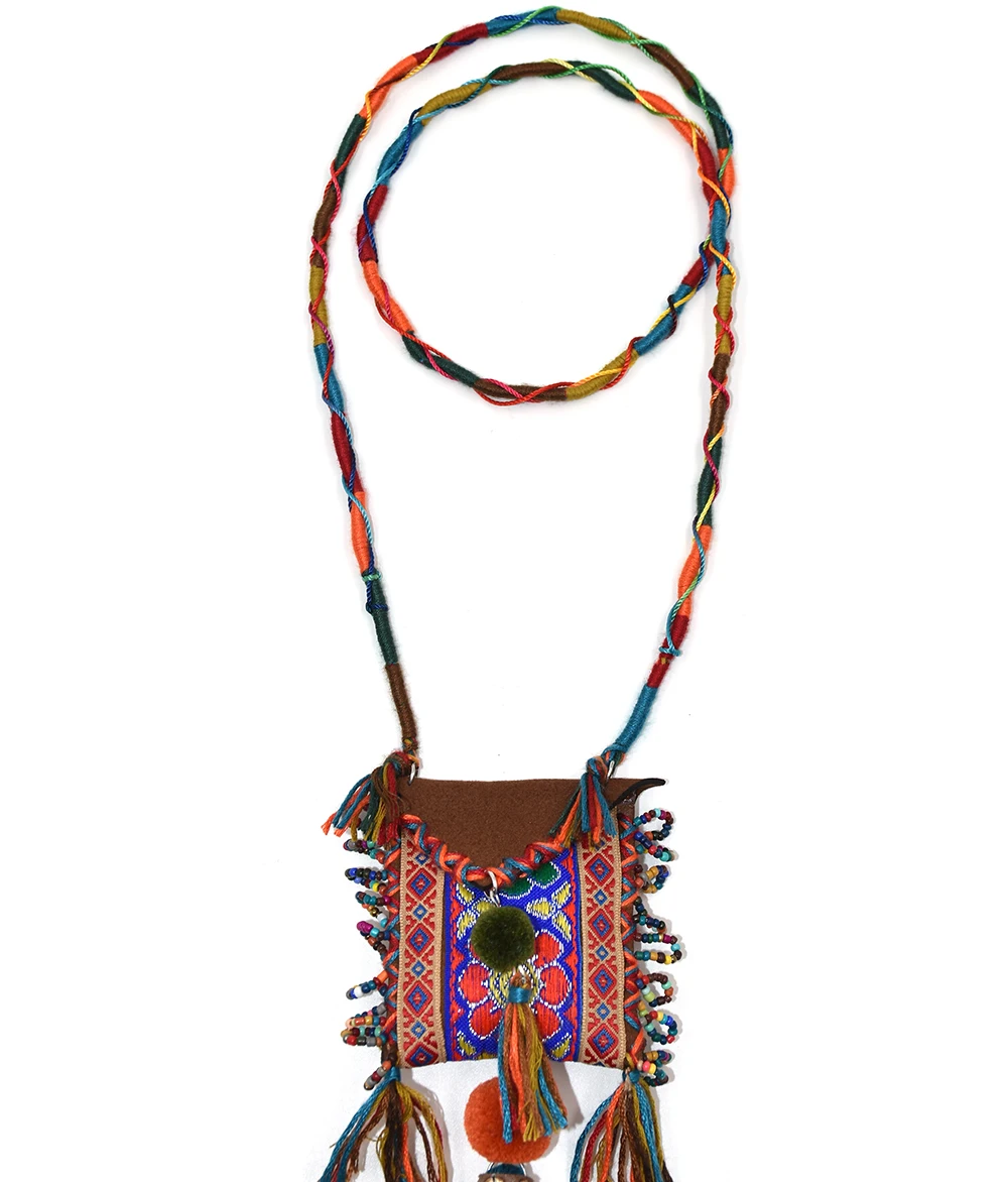 

Gypsy amulet necklace with richly embroidered textiles bead cluster Bohemian Boho chic vintage textile tassel and bead necklace