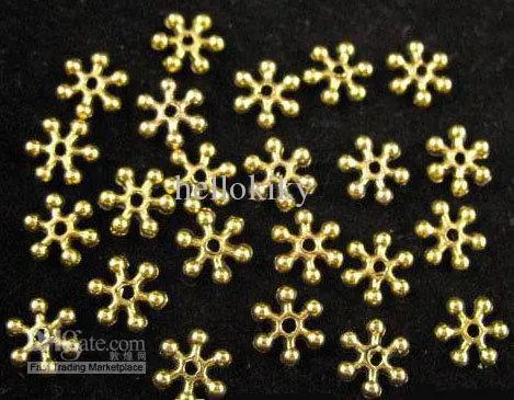 

750 pcs Antiqued gold snowflake spacer beads 7mm FC283G