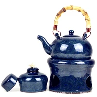 high grade purple clay tea warmer tea stove heating the base of the beam to cook tea pots