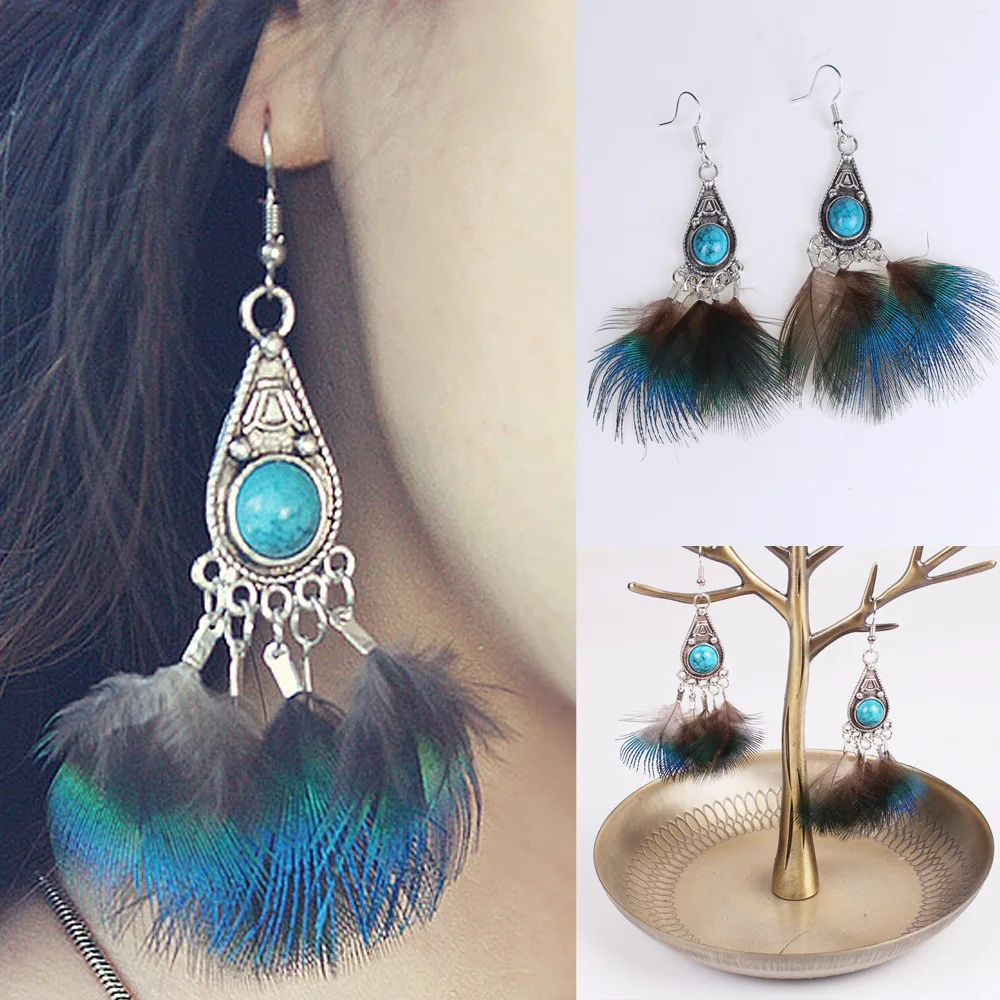 

Natural peacock feather earrings songshi folk dance photography seaside resort personality Bohemian head jewelry