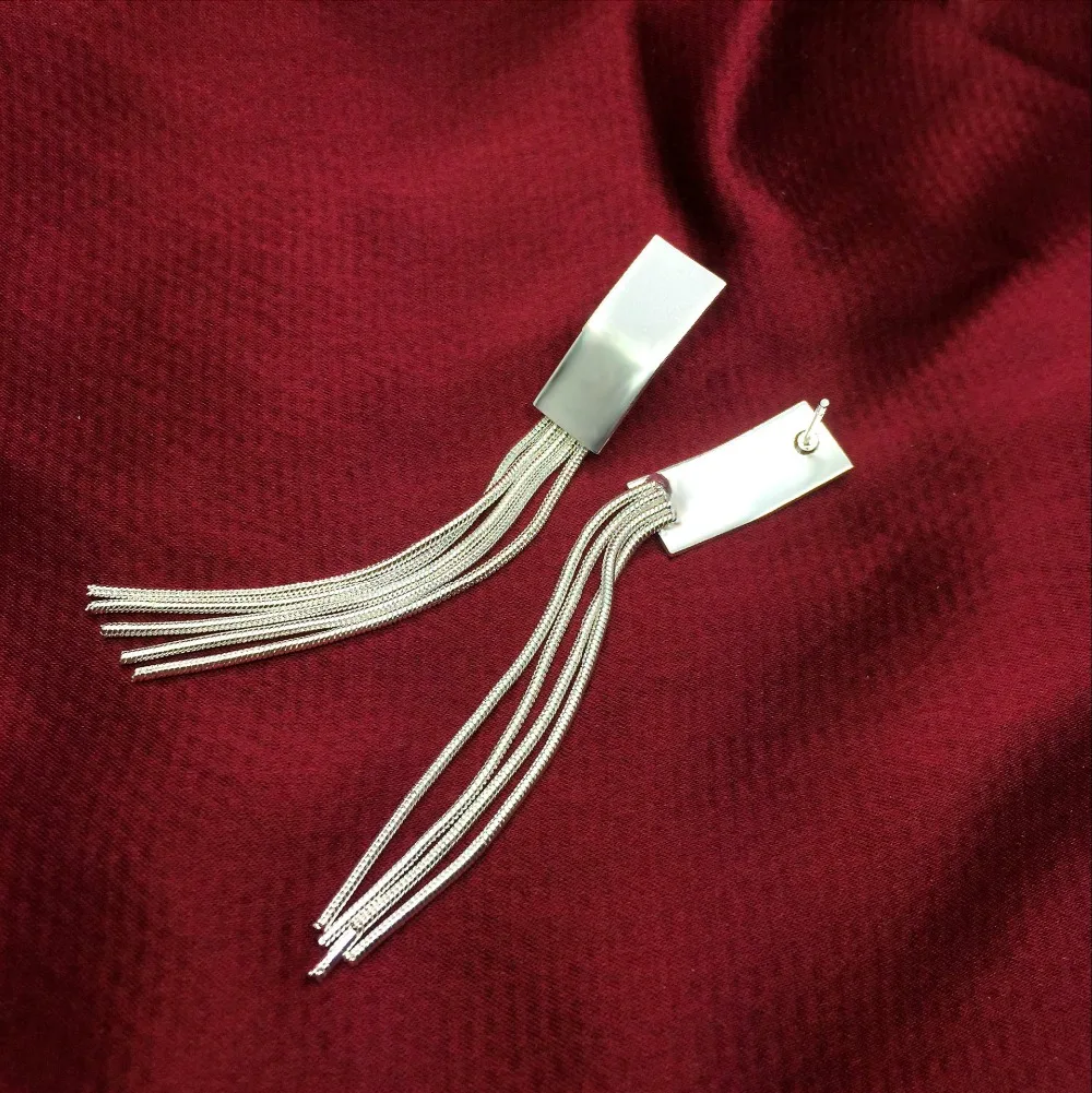 Женские длинные висячие серьги на белой платформе в форме капли с кристаллами