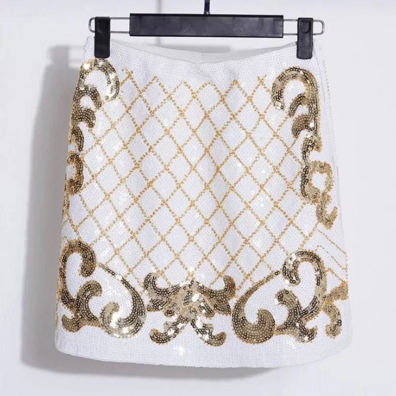

Женская короткая трапециевидная юбка в клетку с блестками и стразами